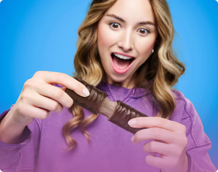 Smiling woman pulling apart a BUILT Puff